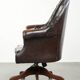 Brown cow leather Chesterfield office chair on wheels in English style