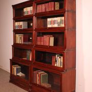 pair of Globe Wernicke London 'waterfall' bookcases in mahogany circa
