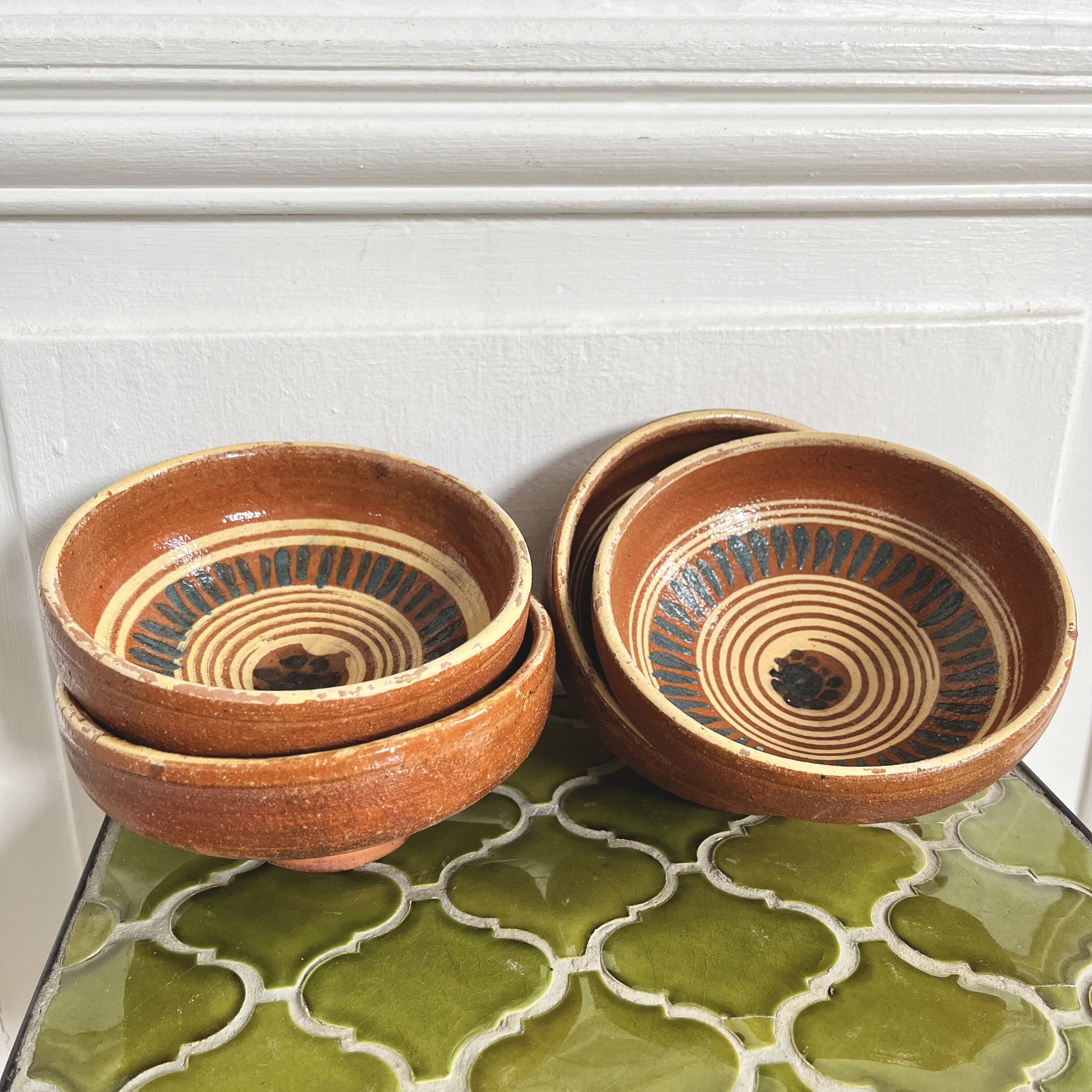 4 old handcrafted pottery bowls
