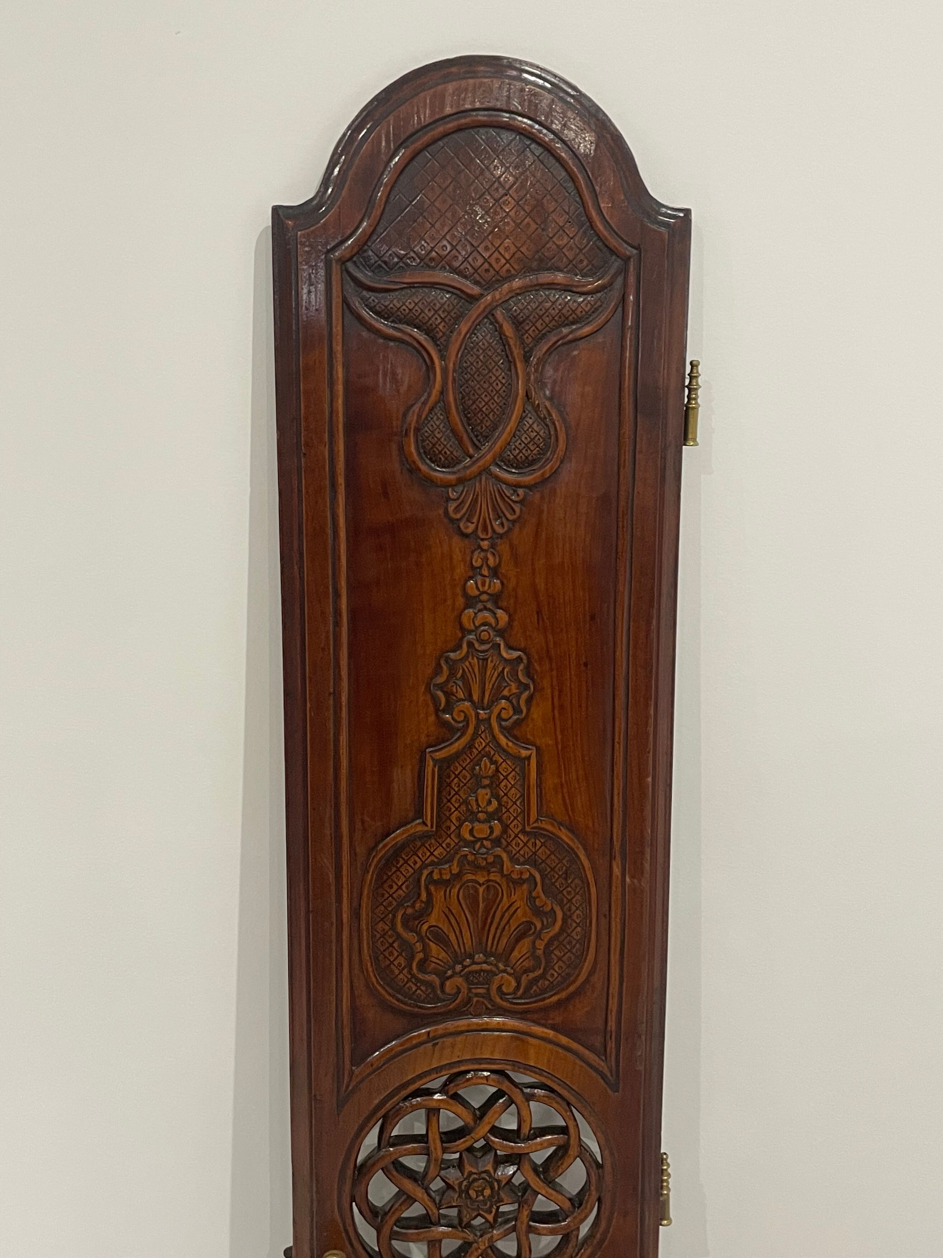 Clock door carved and openwork wood