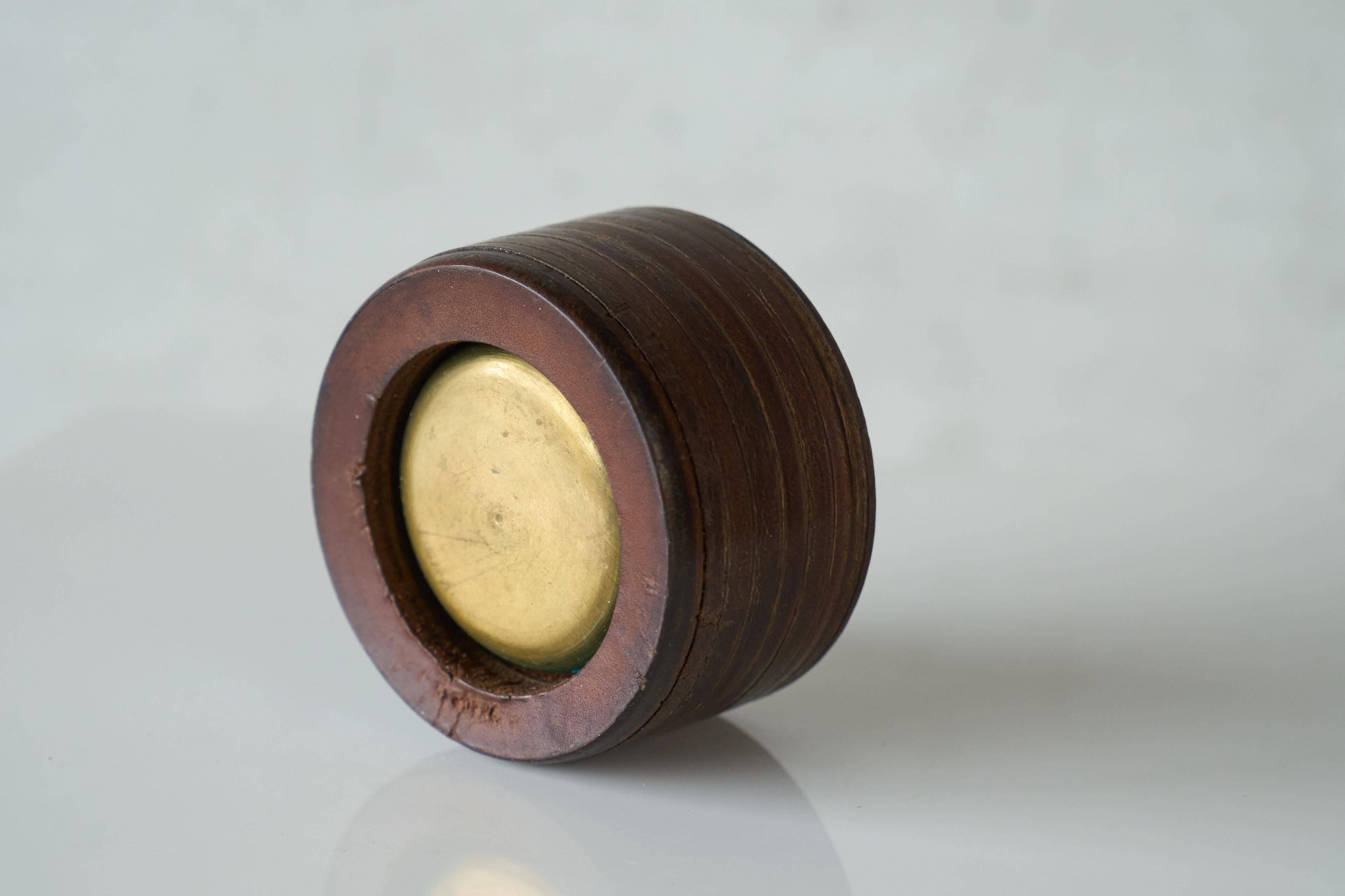 Vintage leather and patinated brass ashtray, 1960s, mid-century design.