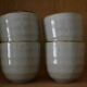 Set of 4 small stoneware tea bowls.
