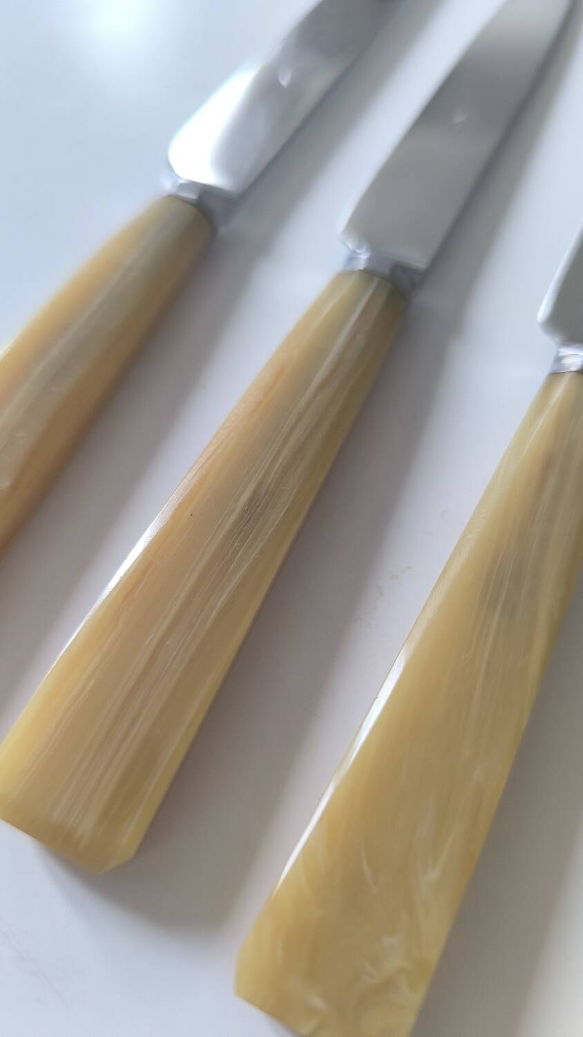 Set of 12 bakelite and stainless steel knives