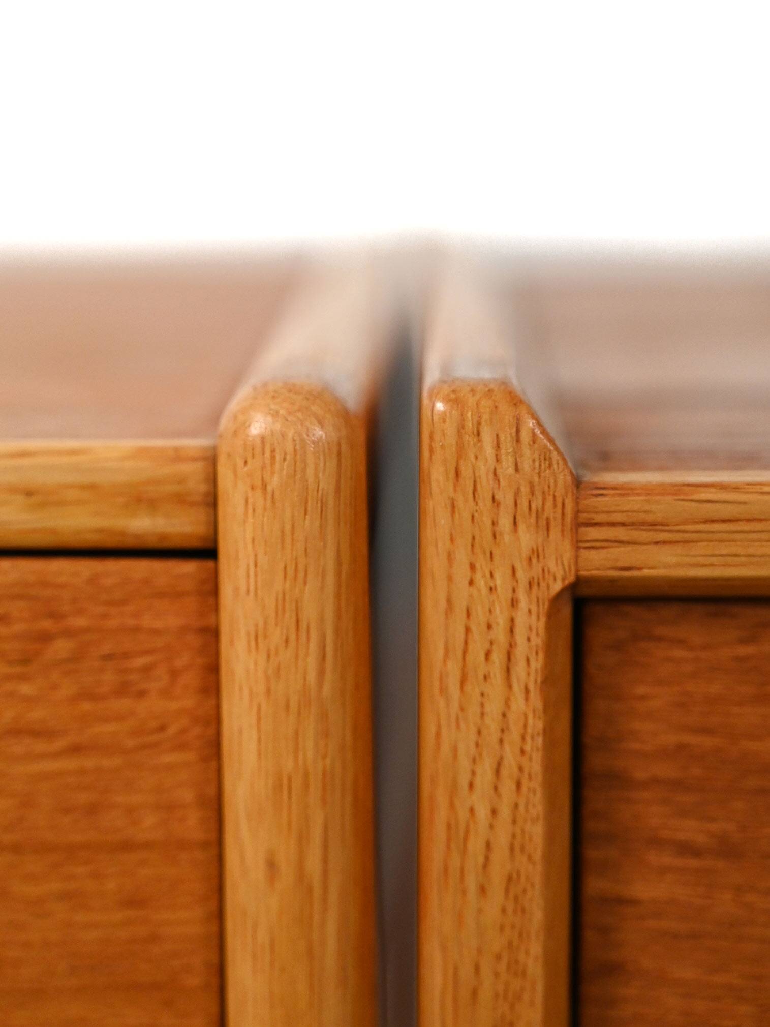 Pair of Scandinavian bedside tables from the 1950s–60s with carved handle