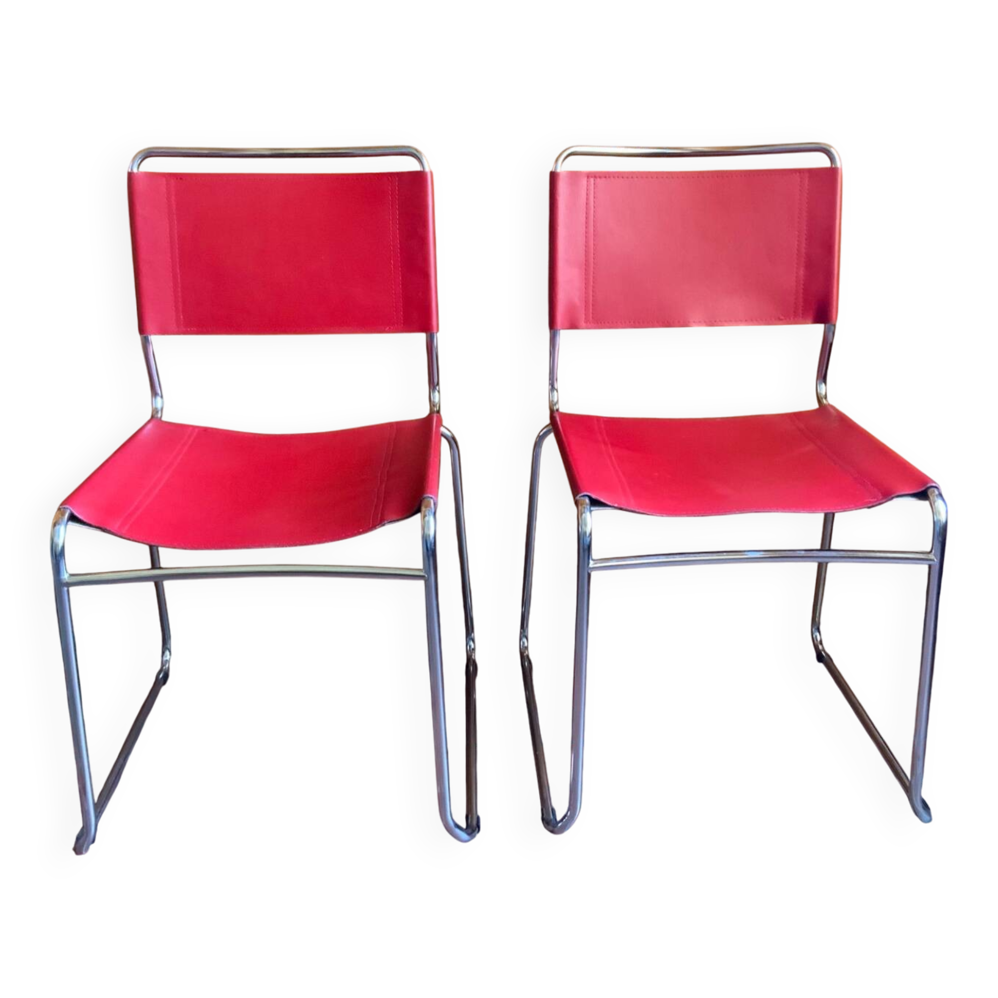 2 tubular chairs in red leather 1970