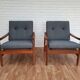 A pair of Danish armchairs, teak, wool, leather