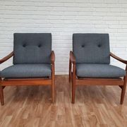 A pair of Danish armchairs, teak, wool, leather
