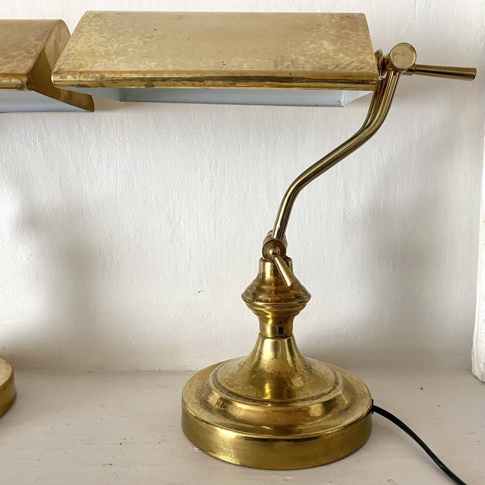 Pair of notary-style lamps in gilded metal