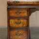 Victorian antique partner's desk in veined walnut with a leather top.