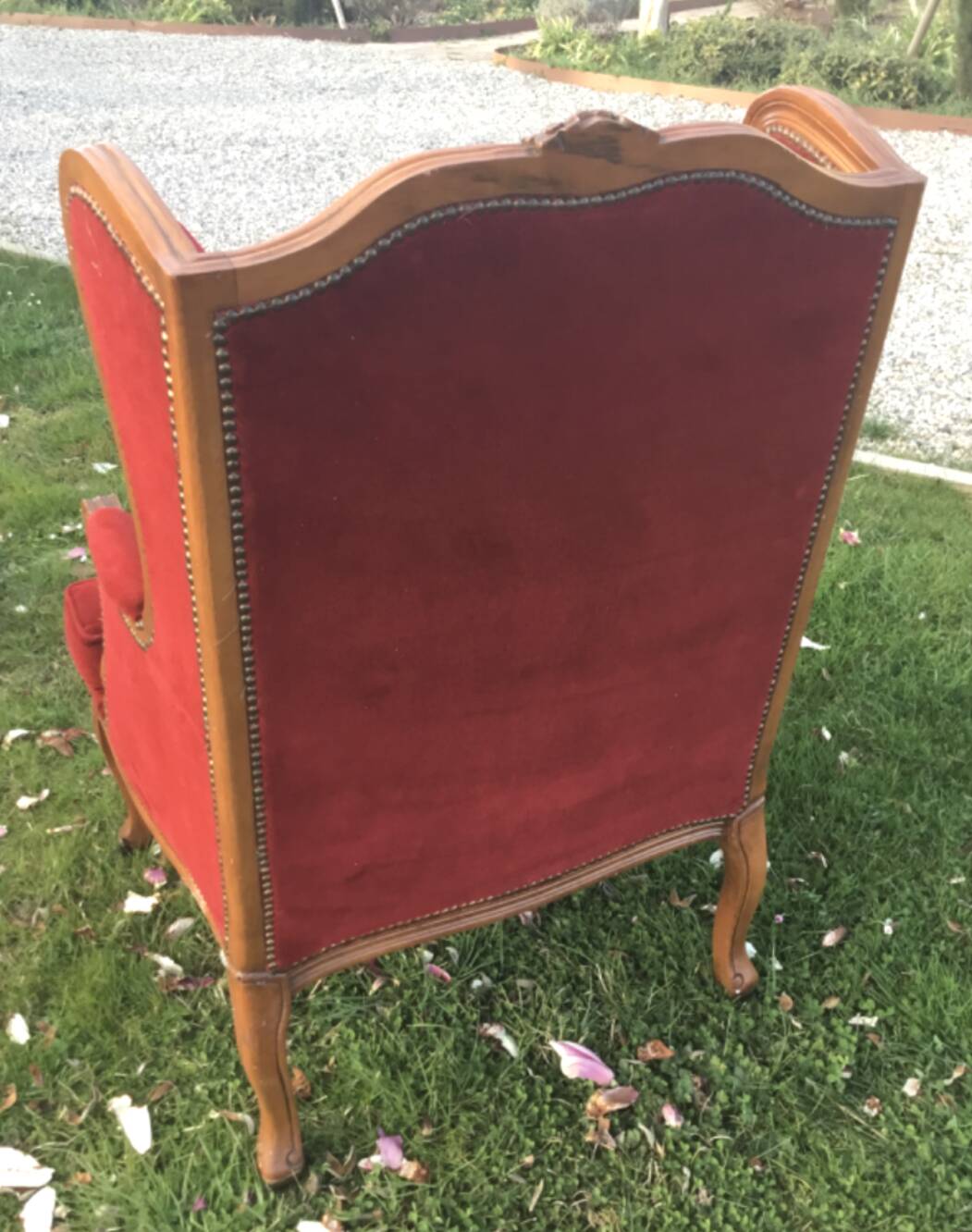 Louis XV style carved wooden shepherdess chair. Red velvet