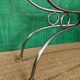 Polished steel and brass console, probably Maison Jansen, France, mid-century modern Hollywood Regency.