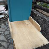 Asymmetrical changing table cabinet