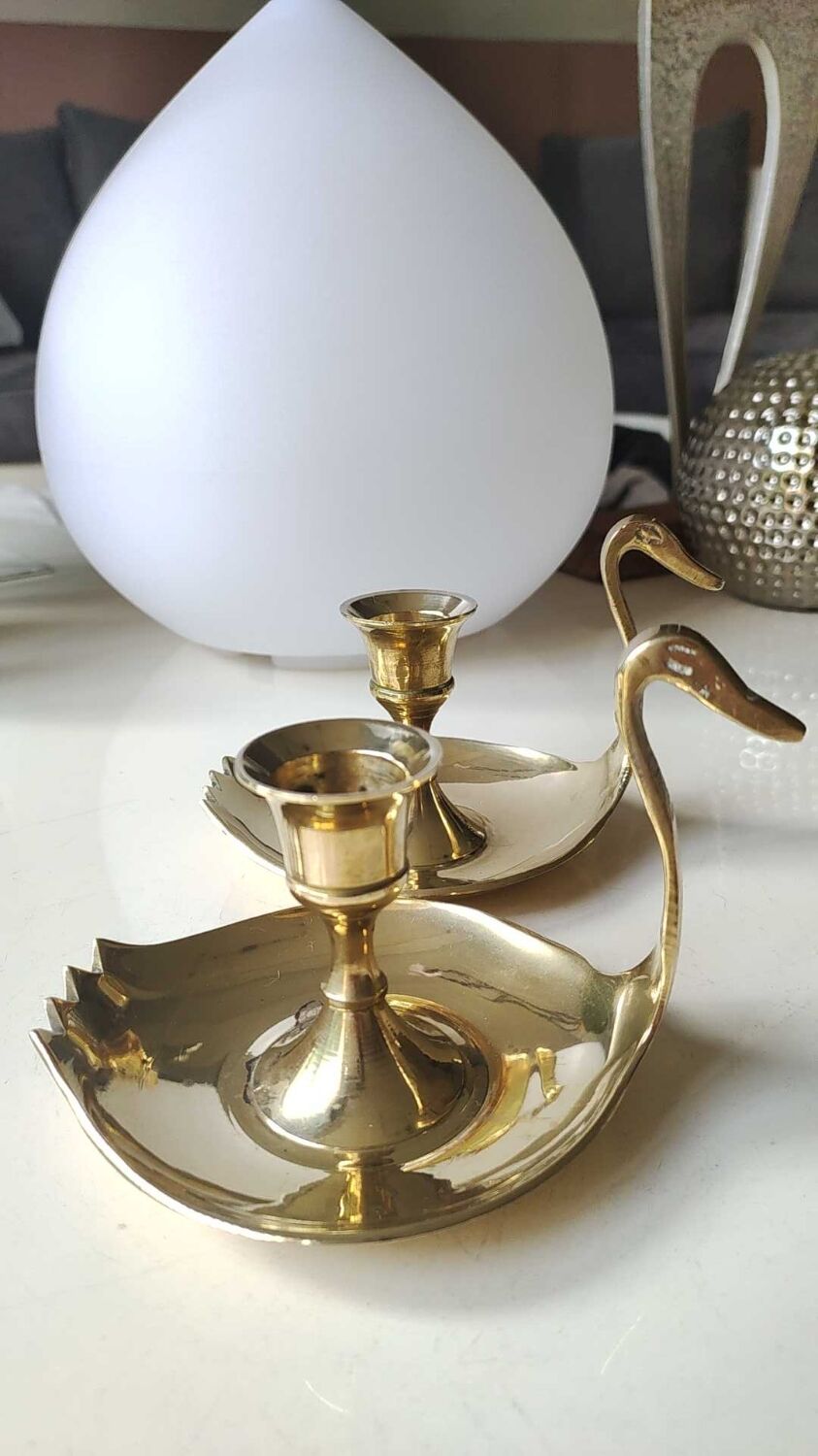 Pair of hand candle holders/Cellar rats shape swans, in polished brass. 1950s