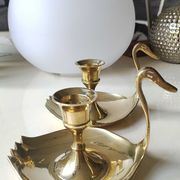 Pair of hand candle holders/Cellar rats shape swans, in polished brass. 1950s