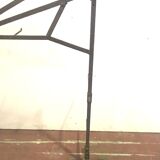 Big in front of hammered iron fireplace