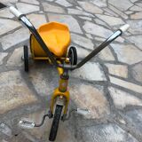 Yellow tricycle with folding bucket