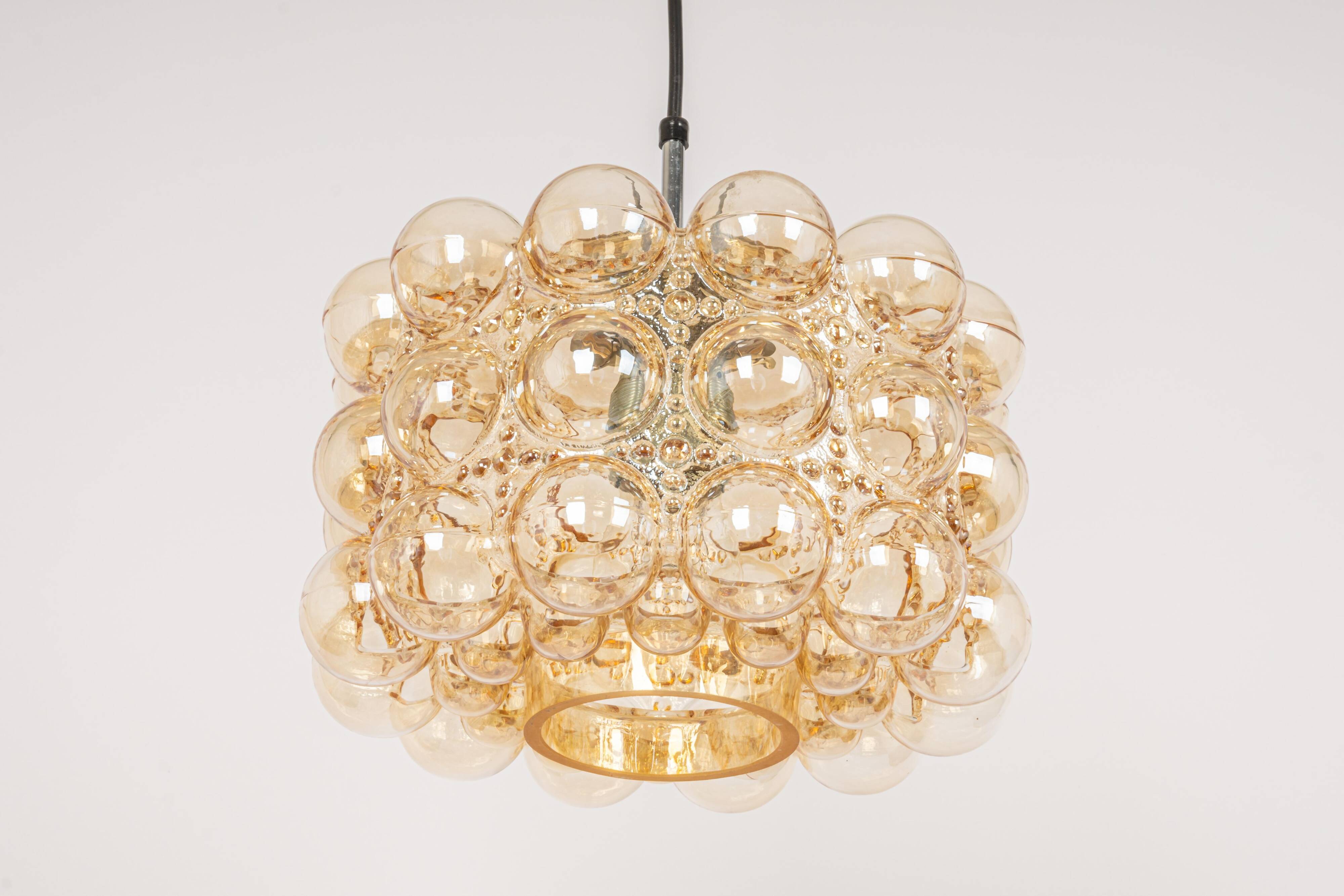 Large amber bubble glass pendant light by Helena Tynell for Limburg, Germany, 1970s.