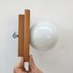 Modernist wall lamp in pine and opaline