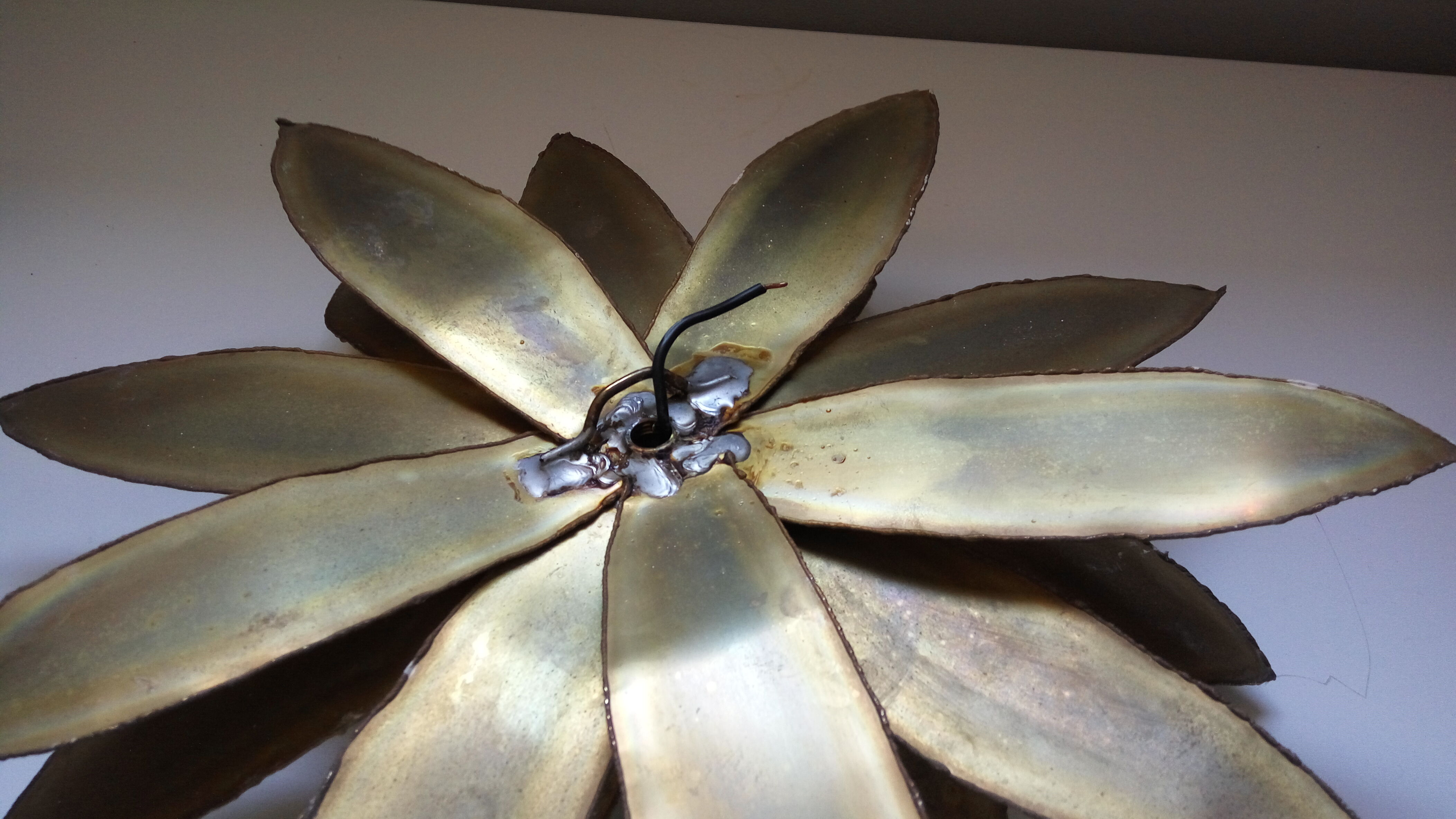 Brass flower wall light