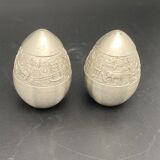 Egg-shaped metal salt and pepper shakers with Asian countryside motif