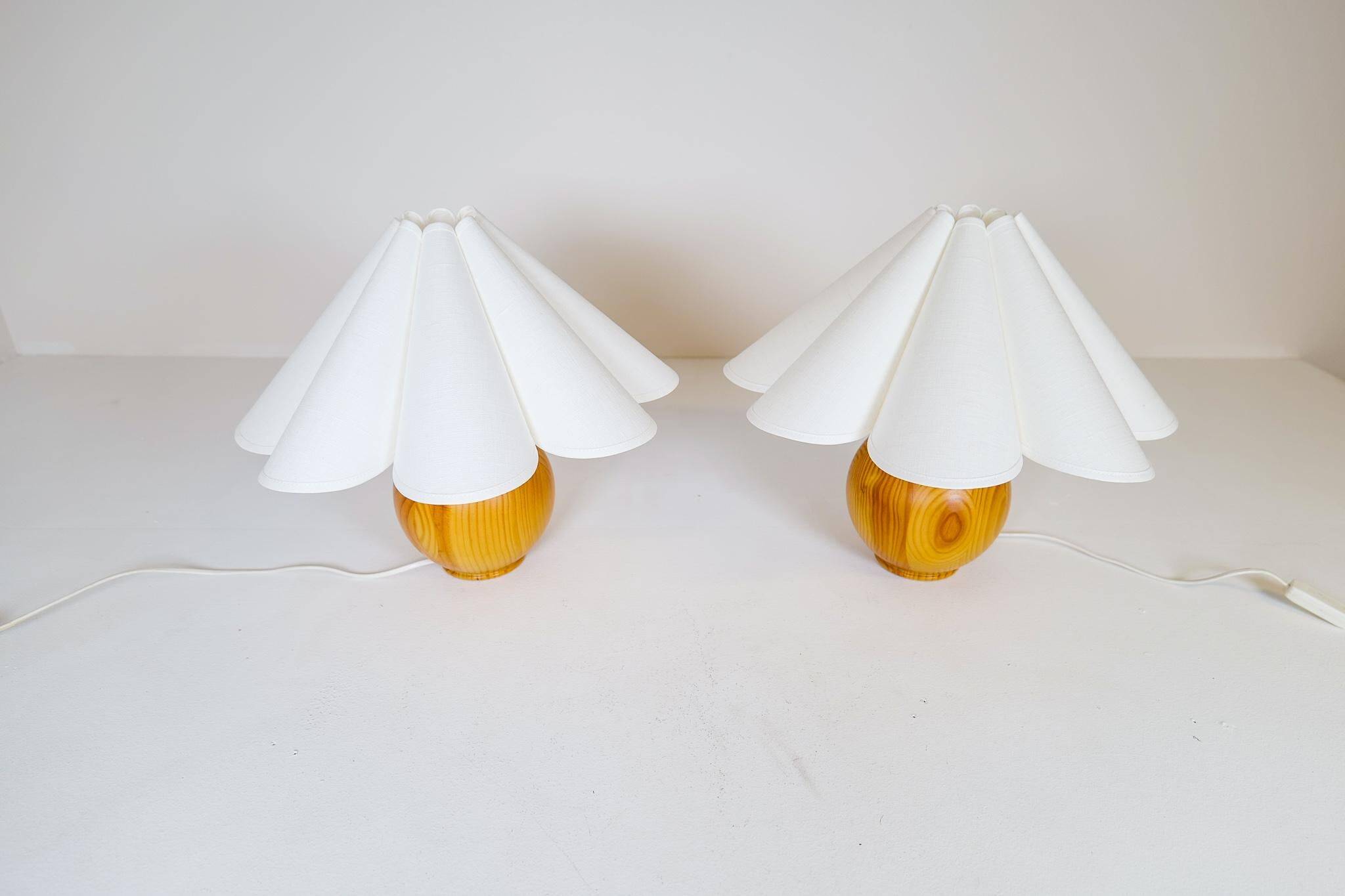 Sculptural modern table lamps from the mid-century in solid pine, Sweden, 1970s.