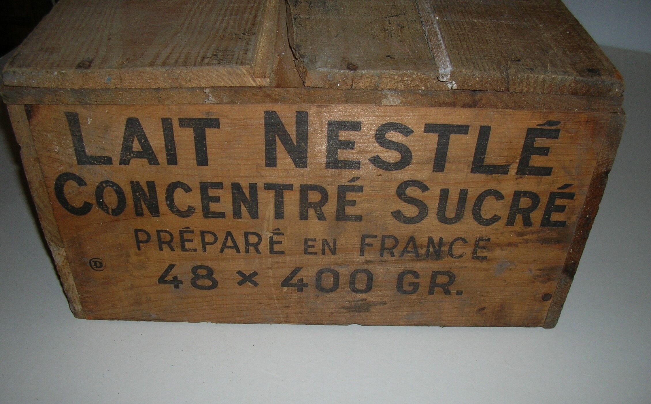 Nestle case in condensed milk wood before 1955