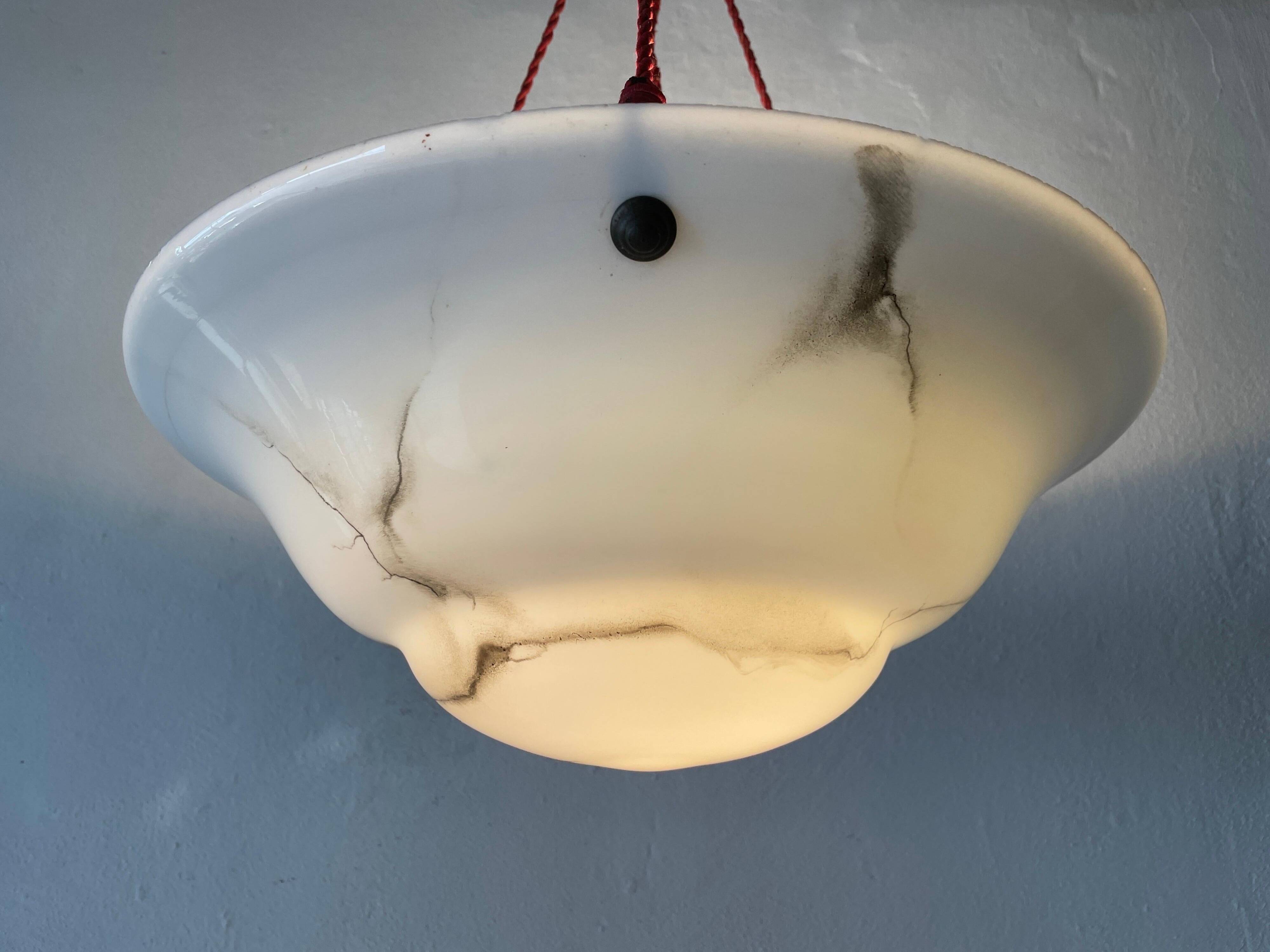 Art Deco suspended lamp in white marble-effect glass, 1940s, Germany.