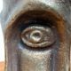 Abstract vase with a brutalist bronze face from the mid-century.