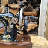 Old Singer sewing machine on its original base