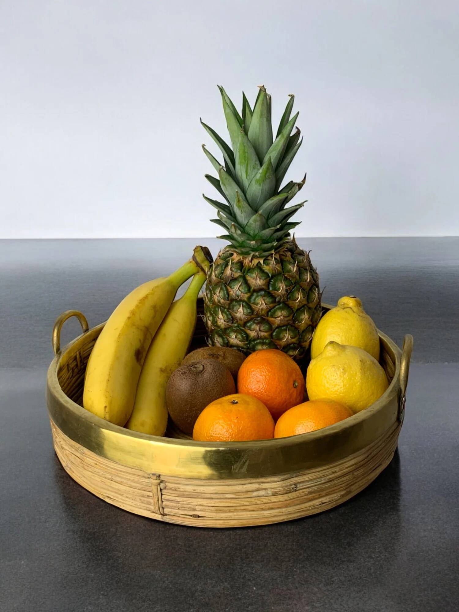 Circular rattan and brass tray, Italy, circa 1970s