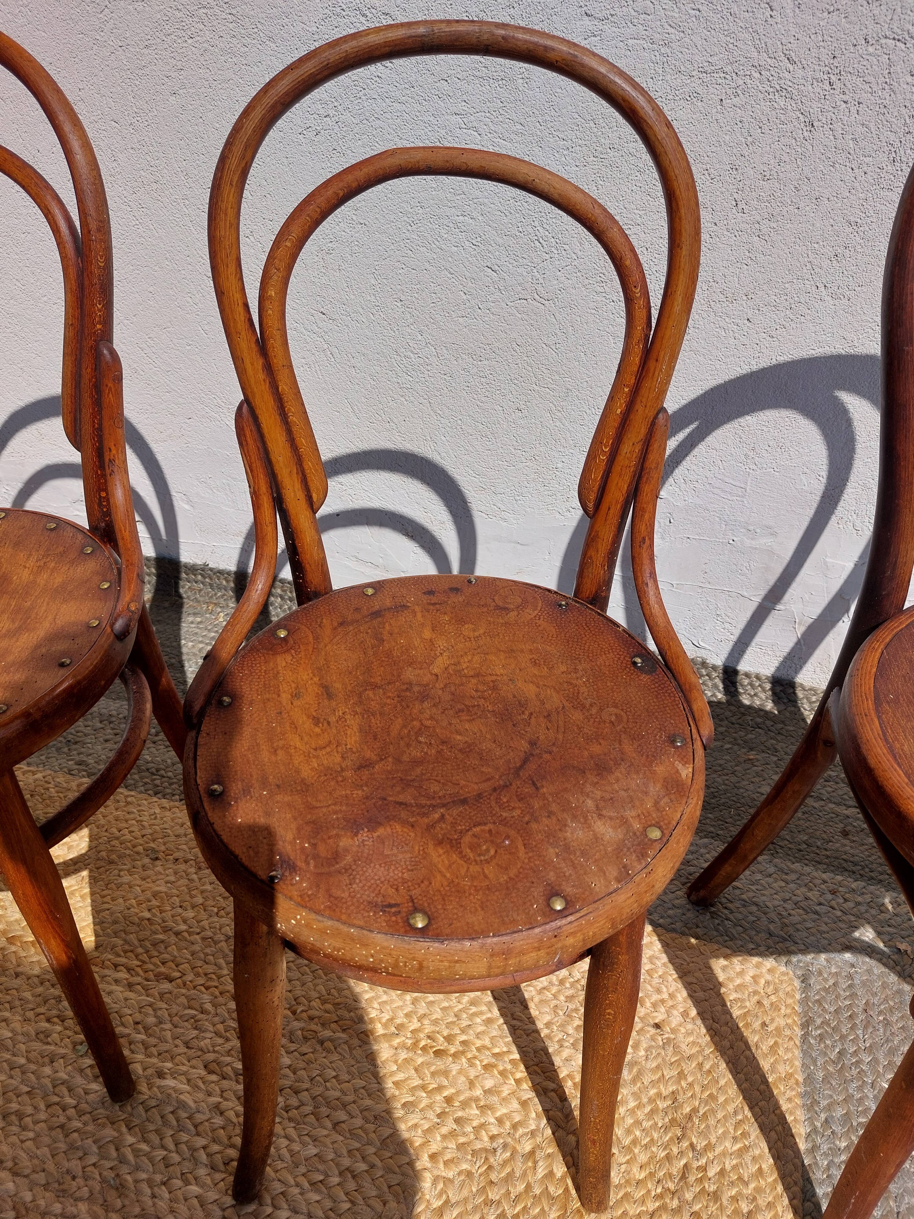 4 curved wooden bistro chairs