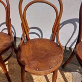 4 curved wooden bistro chairs