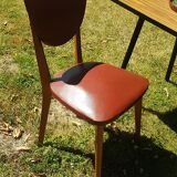 Paire de chaises type Baumann skaï 1960 pieds compas