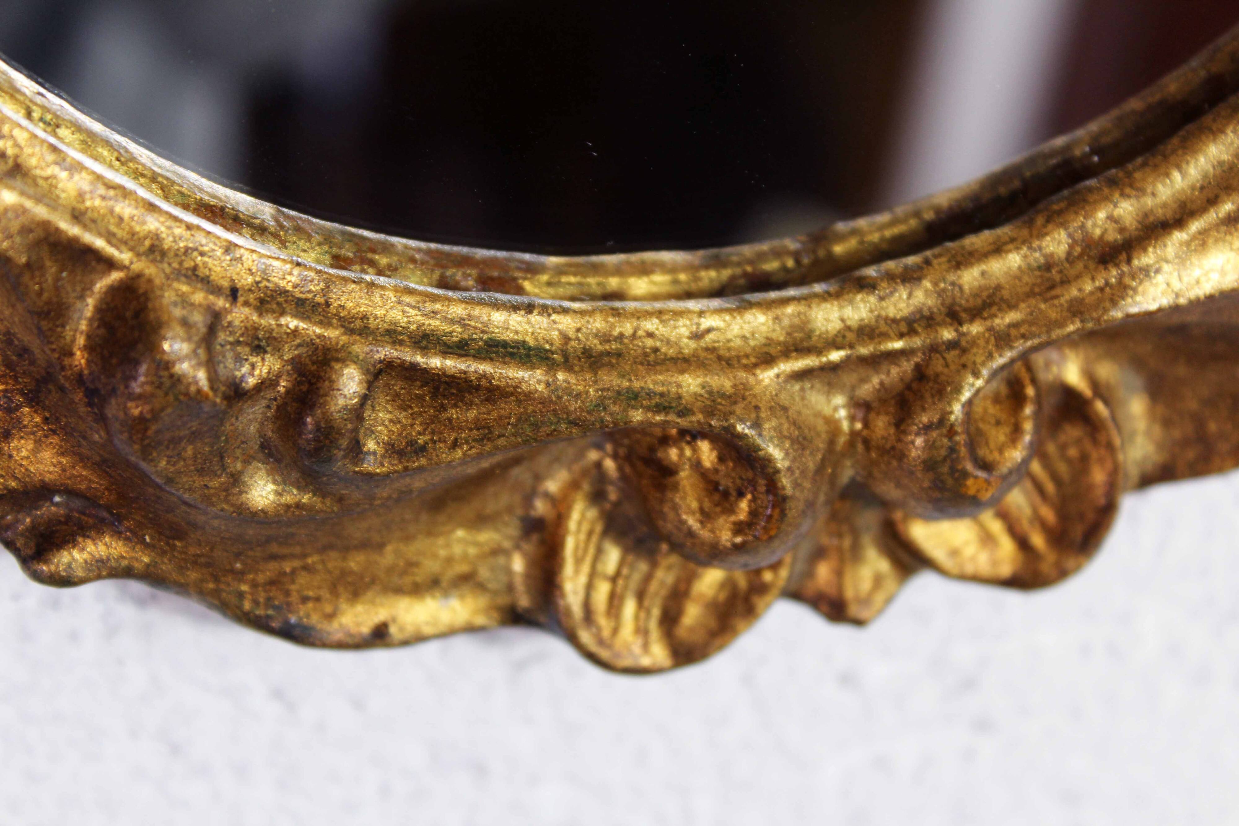 Round gold leaf mirror