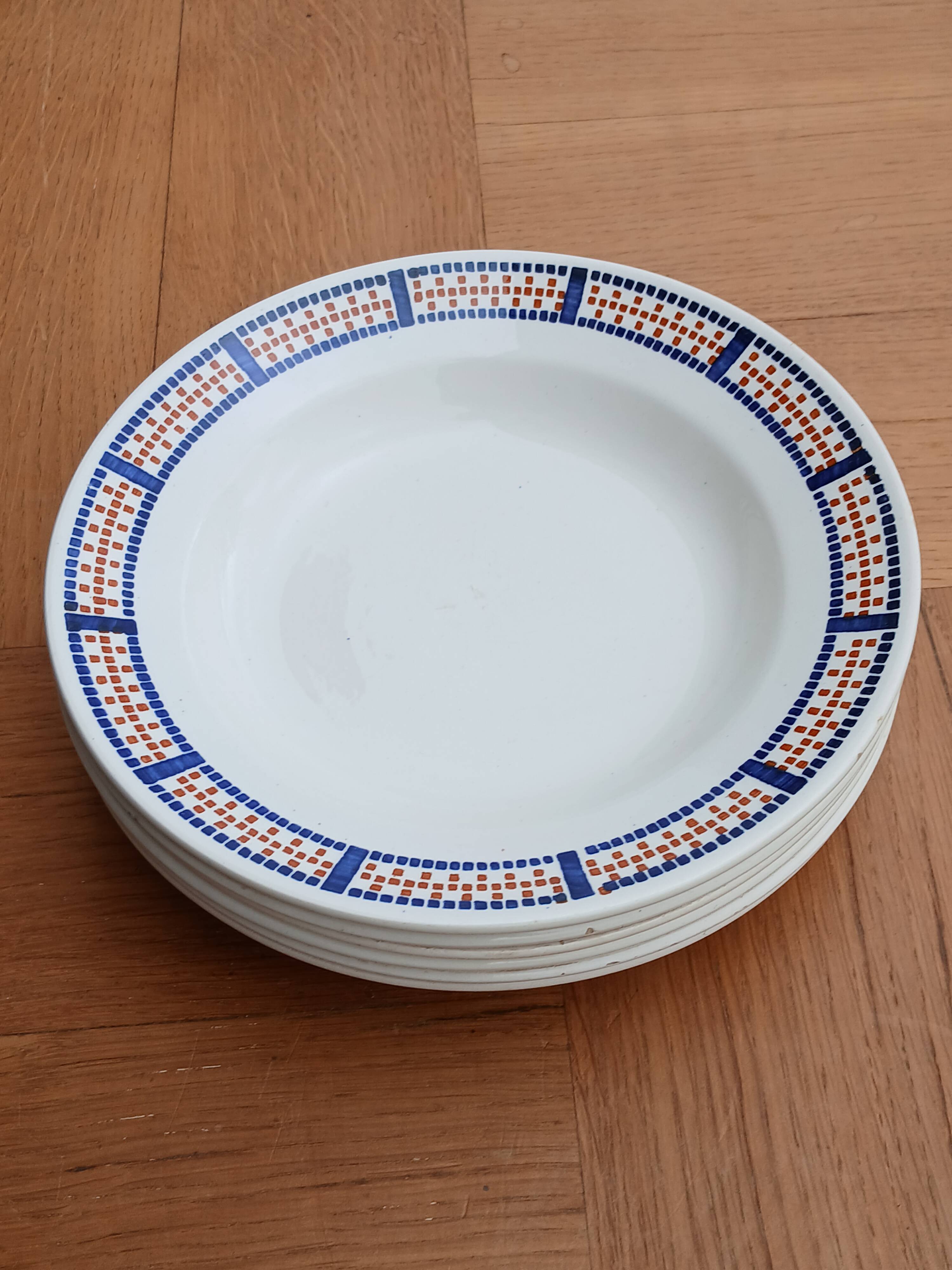 Six antique soup plates