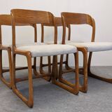 Set of 4 Baumann sled chairs, France circa 1970.