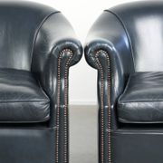 Set of dark blue cow leather club armchairs with a unique design