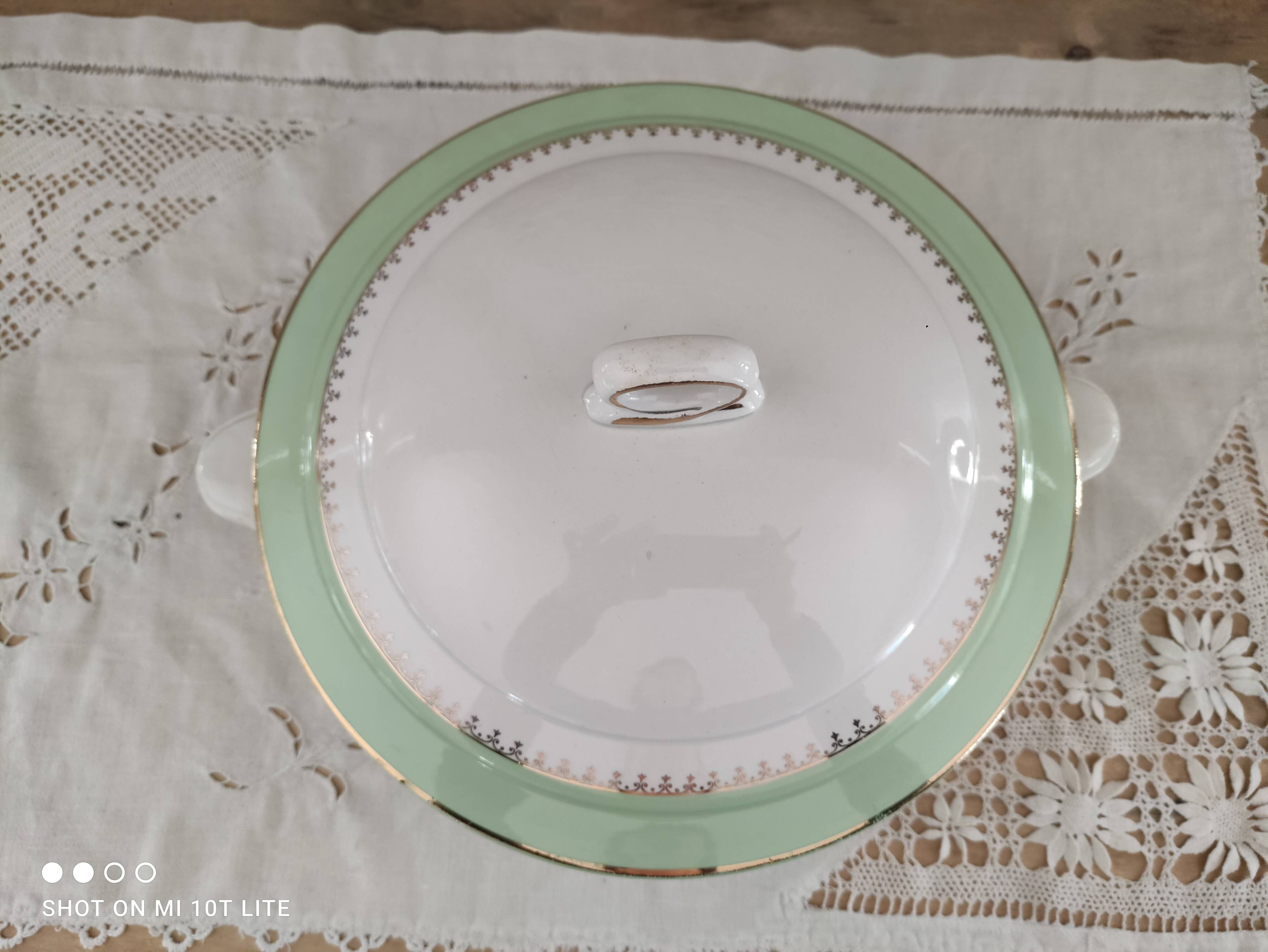 Soup tureen in water green with golden frieze, Cafés Lemaire.