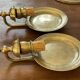 Pair of vintage wall sconces in textured brass, brutalist style.