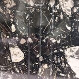 Black travertine eye coffee table