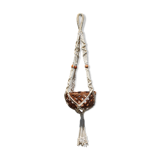 Hanging plant holders in macramé and rattan