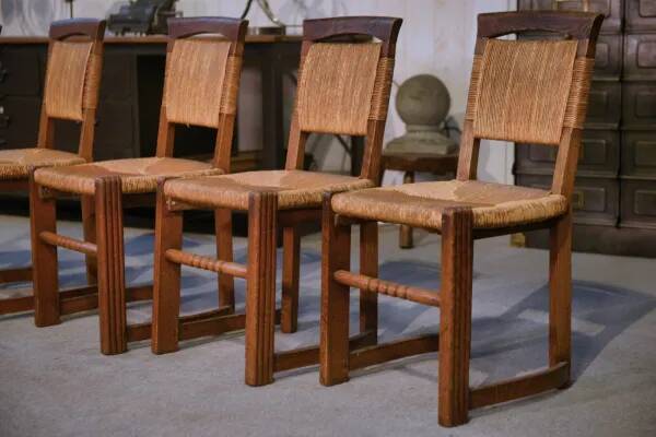 Ensemble de 5 chaises en chêne et jonc dans le goût de Charles Dudouyt 1950’s