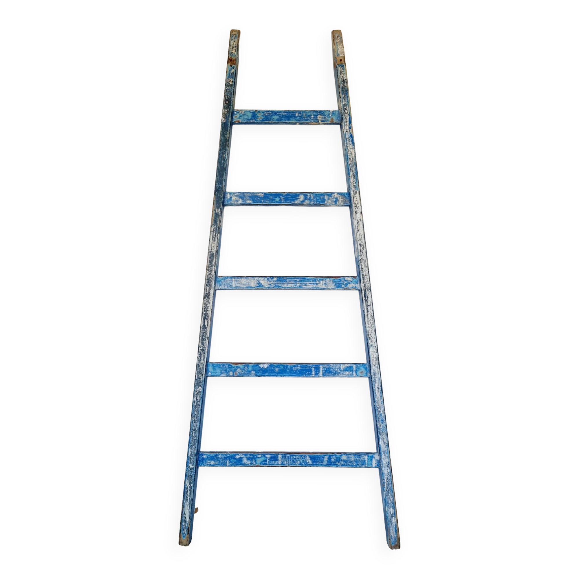 Old ladder in blue wood
