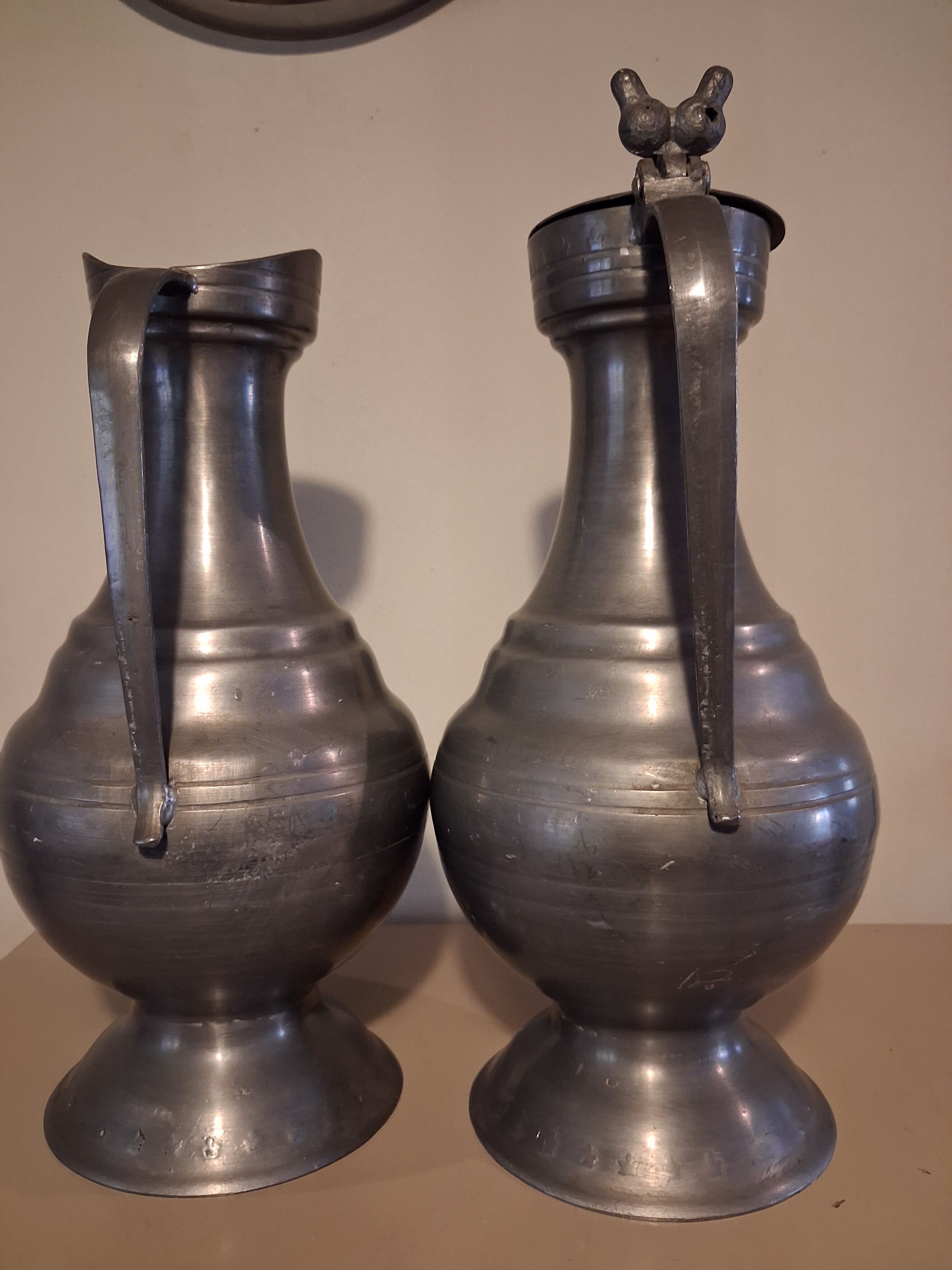 Large vintage pewter jugs