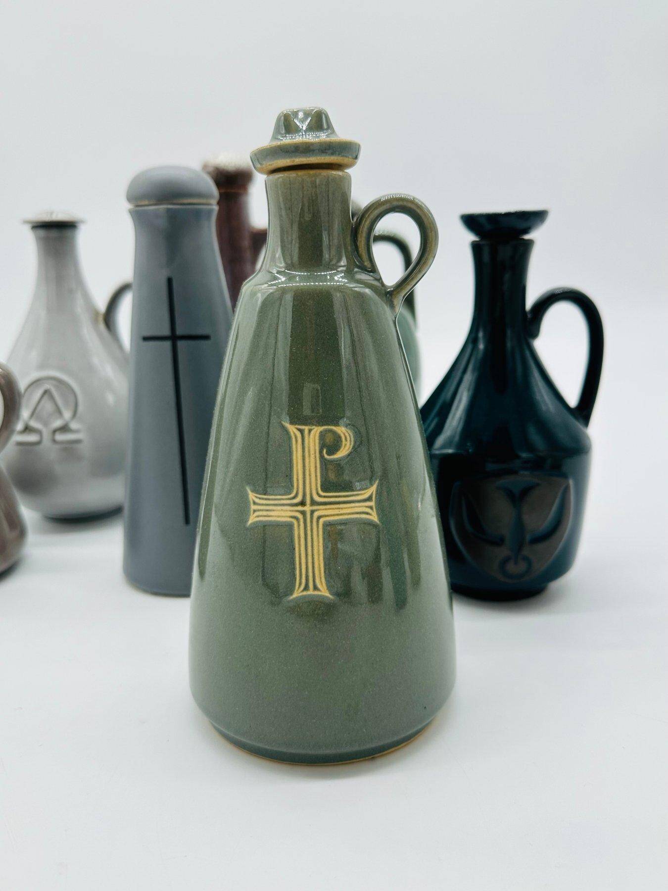 Set of nine modern sculptural ceramic vases from the mid-century, Bauhaus influence.