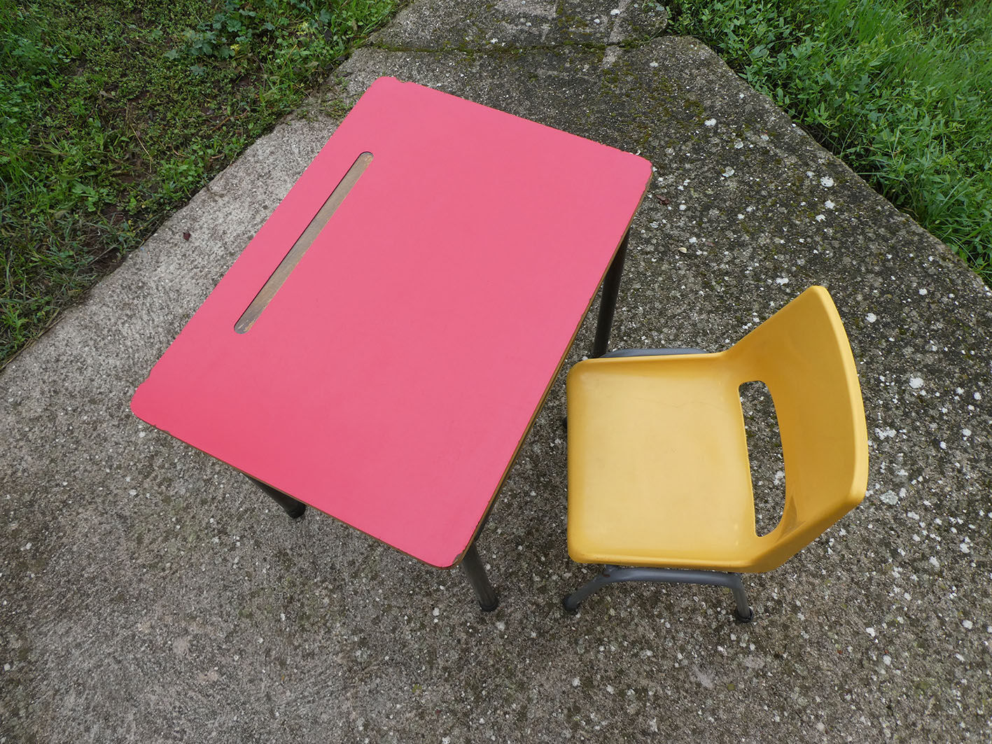 Child desk and vintage schoolboy chair