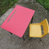 Child desk and vintage schoolboy chair