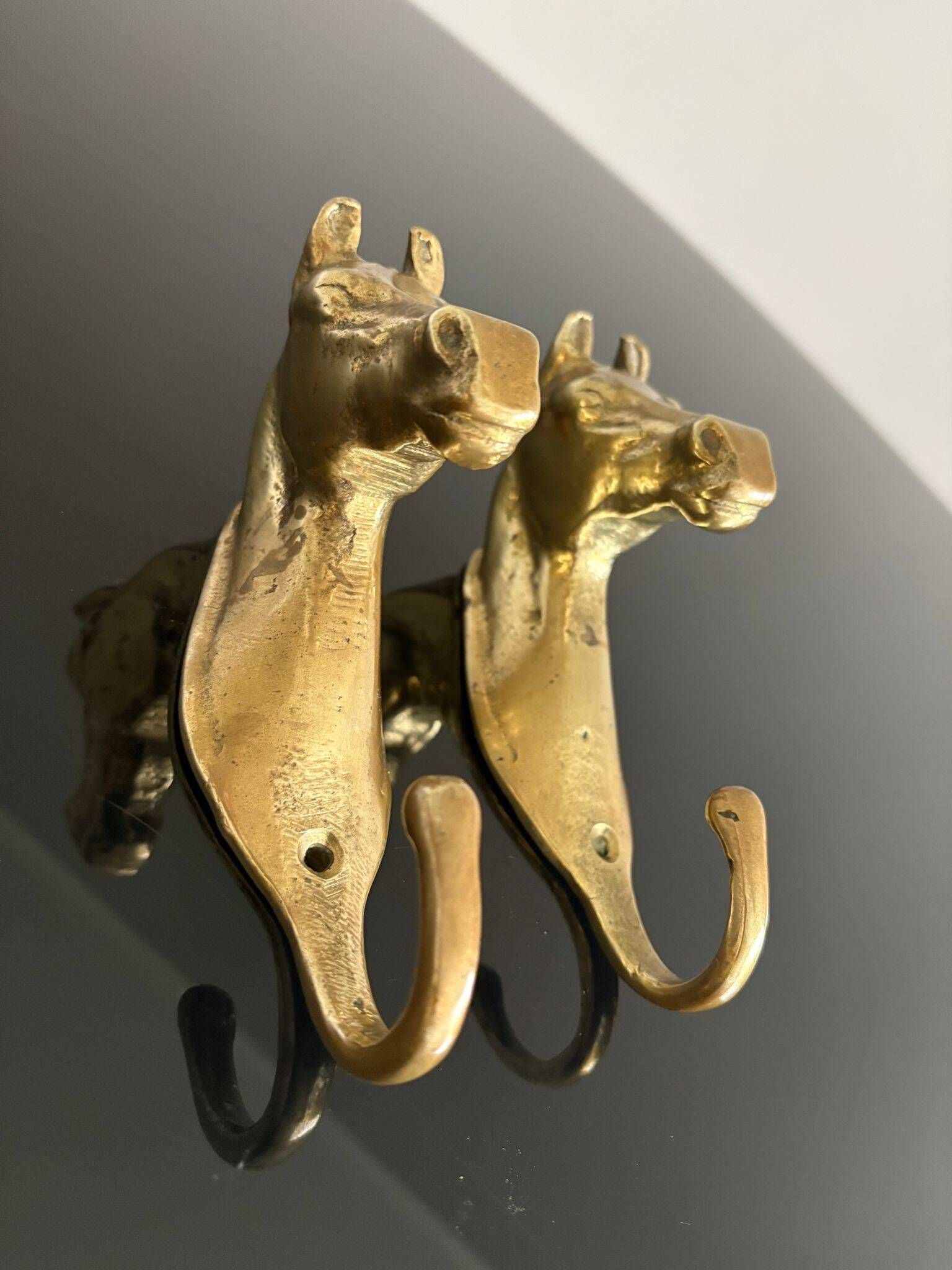 Pair of bronze coat hooks - Italy, 1950s