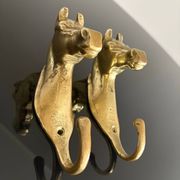 Pair of bronze coat hooks - Italy, 1950s
