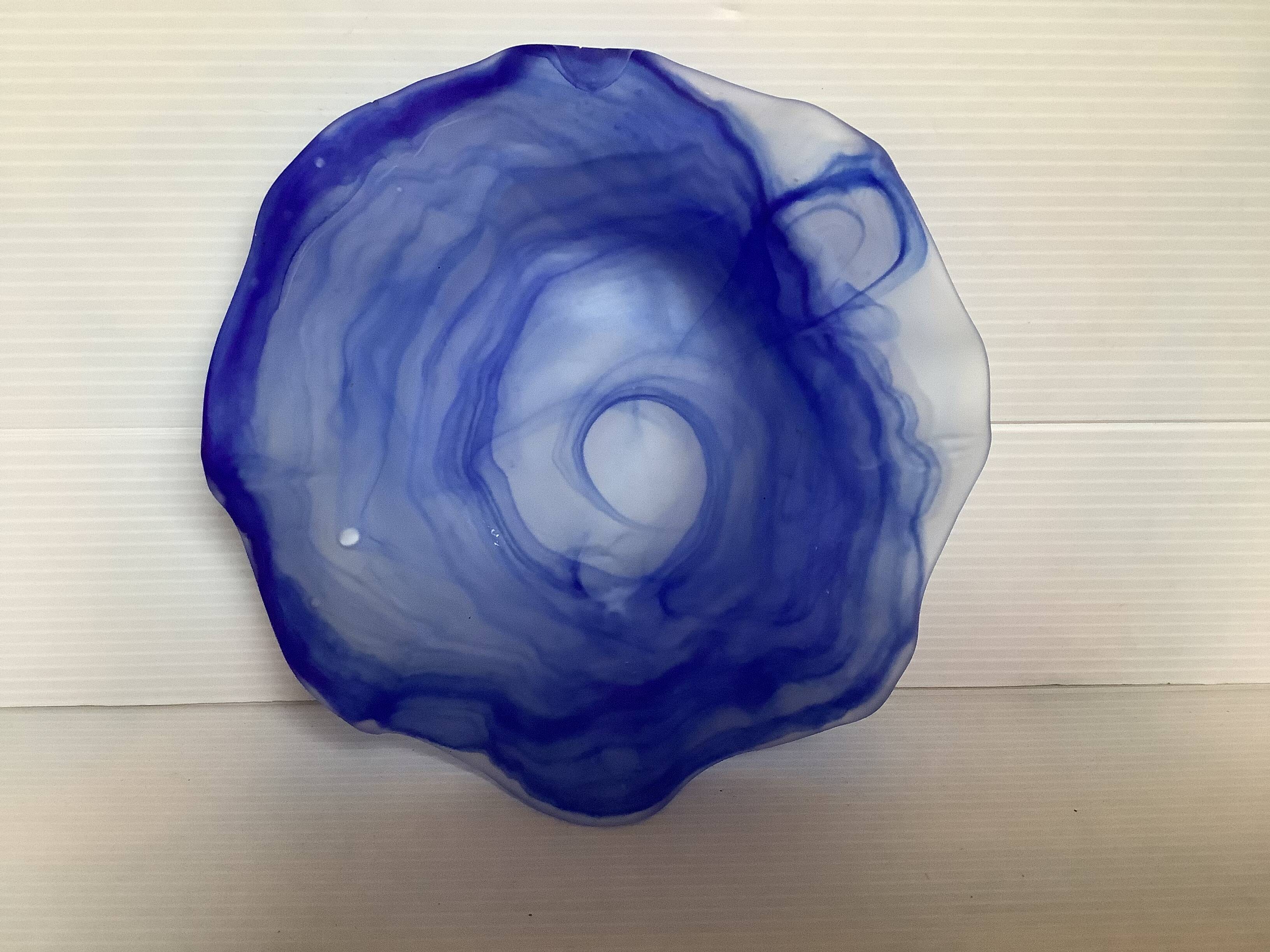 Cobalt blue glass ring with a scalloped edge